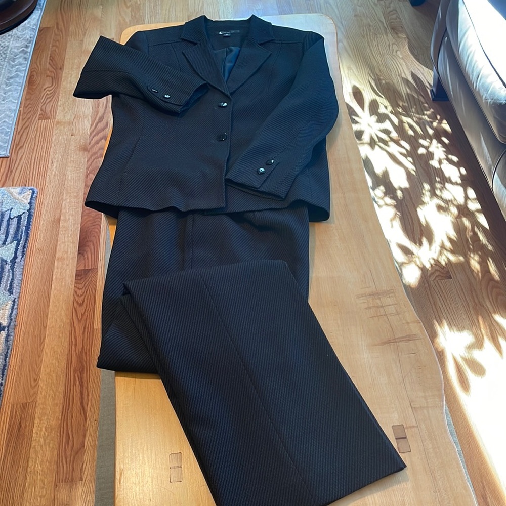 Classic black pants suit, tailored back, interesting weave.